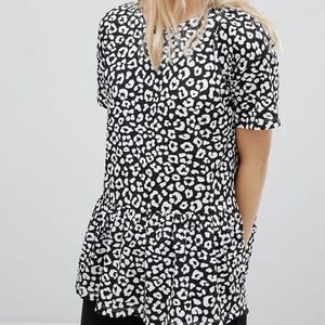 ASOS DESIGN Smock Top With Ruffle Hem In Mono Animal Print
- Mono / US 6